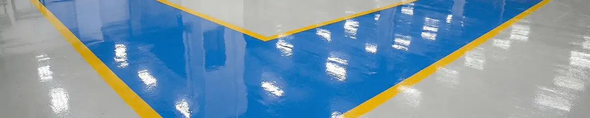 A factory floor professionally covered and marked with epoxy flooring in Milwaukee, WI