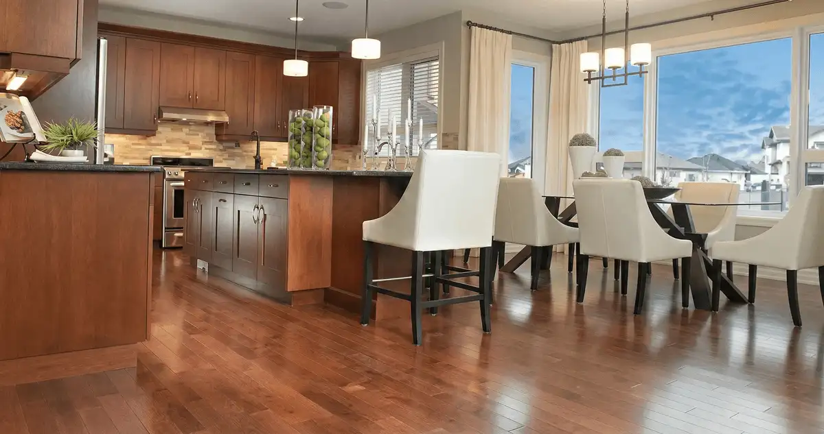 A modern kitchen with professionally installed wood flooring in Milwaukee, WI