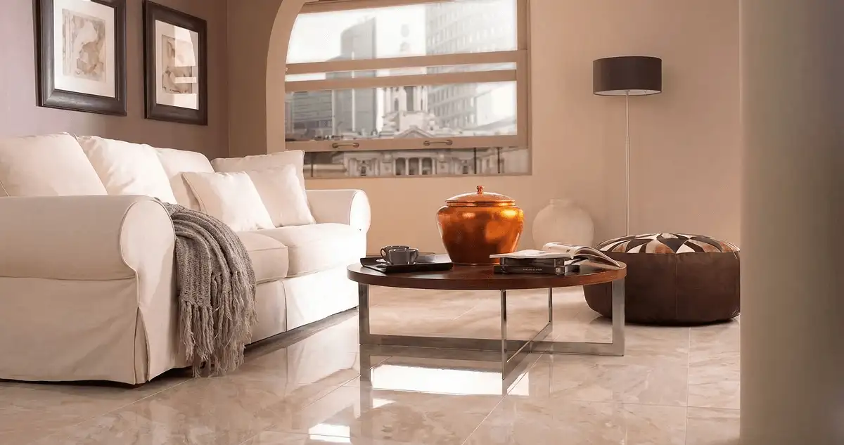 Modern living room with professionally installed marble flooring, a beige sofa, coffee table in Milwaukee, WI