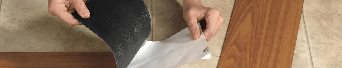 A professional installing vinyl flooring in Milwaukee, WI